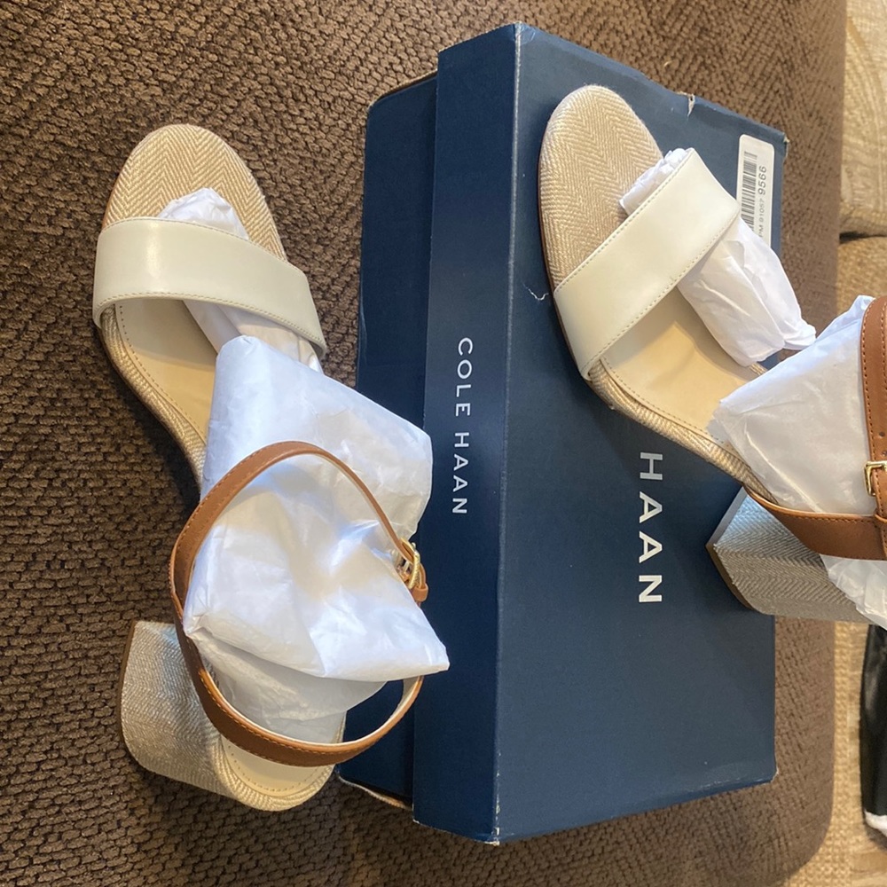 Cream color pair of heel in the size of 8.5 and the brand is Cole haan